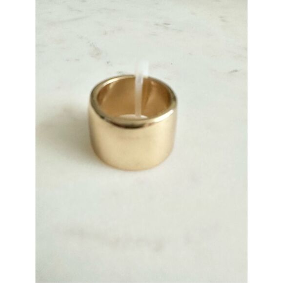 Sleek wide gold color ring size 7 ￼ - Picture 1 of 3